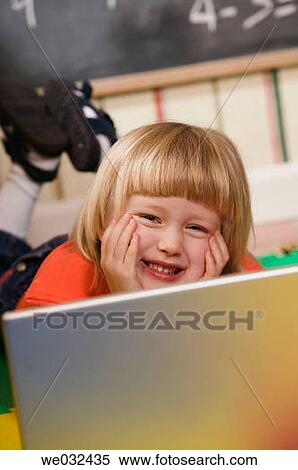 4 year old Caucasian girl and laptop View Large Photo Image Stock Photography - 4 year old Caucasian girl and laptop. Fotosearch