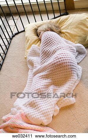 4 year old Caucasian girl napping on floor View Large Photo Image Stock Image - 4 year old Caucasian girl napping on floor. Fotosearch