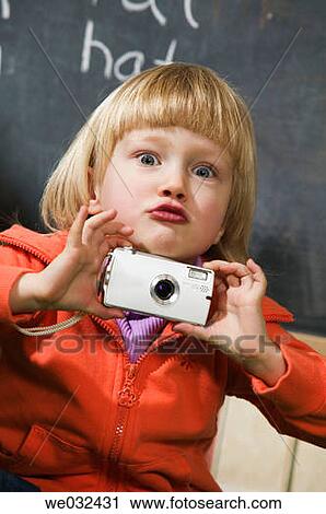 4 year old Caucasian girl with digital camera View Large Photo Image Stock Image - 4 year old Caucasian girl with digital camera. Fotosearch