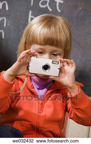 4 year old Caucasian girl with digital camera View Large Photo Image Stock Image - 4 year old Caucasian girl with digital camera. Fotosearch