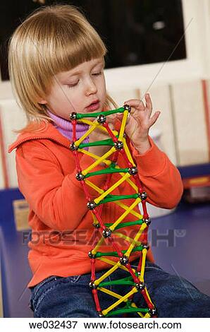 4 year old Caucasian girl with magnetic build game View Large Photo Image Stock Photo - 4 year old Caucasian girl with magnetic build game. Fotosearch