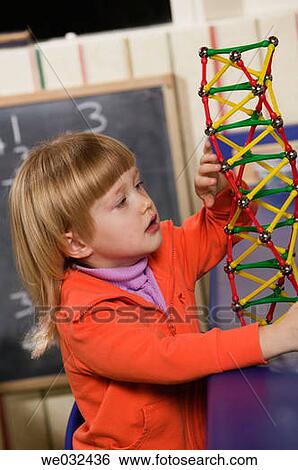 4 year old Caucasian girl with magnetic build game View Large Photo Image Stock Photograph - 4 year old Caucasian girl with magnetic build game. Fotosearch