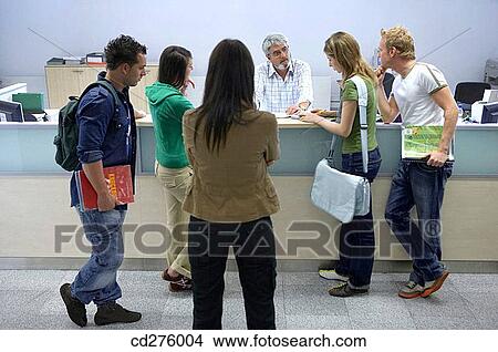 Picture - adolescence, college, boy, Admission desk. Fotosearch