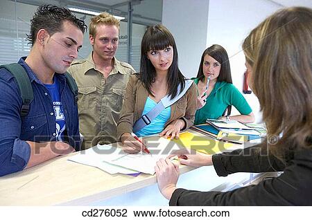 Stock Image - adolescence, college, boy, Admission desk. Fotosearch