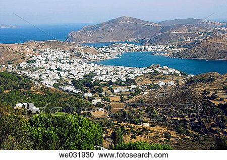 Aerial views of the whitewashed buildings of the village and port of Scala on the island of Patmos, Greece. View Large Photo Image Stock Image - Aerial views of the whitewashed buildings of the village and port of Scala on the island of Patmos, Greece.. Fotosearch