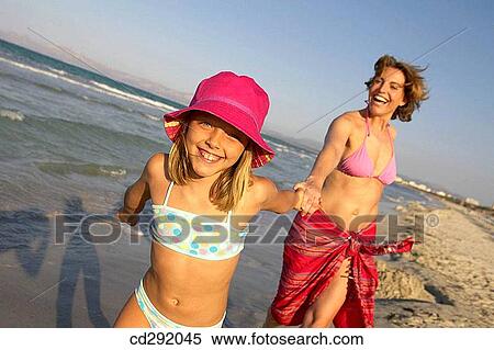 affection, beach, amusement, 30's View Large Photo Image Stock Photography - affection, beach, amusement, 30's. Fotosearch