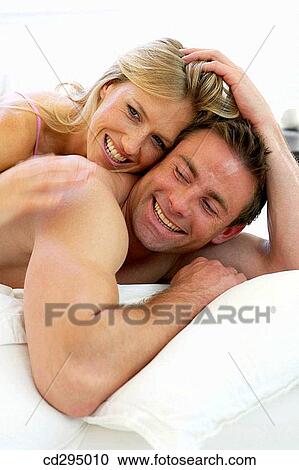 affection, bedroom, bed, at-home, 30's View Large Photo Image Stock Image - affection, bedroom, bed, at-home, 30's. Fotosearch