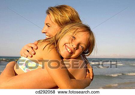 affection, bond, beach, 30's View Large Photo Image Stock Photo - affection, bond, beach, 30's. Fotosearch