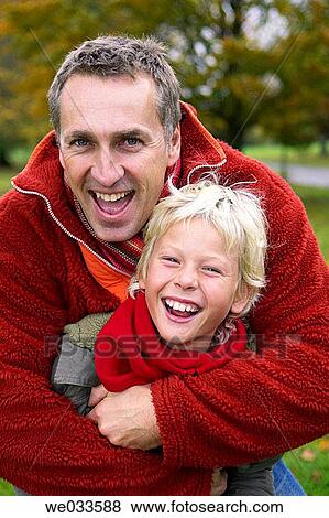 Stock Photo - affection, bonding, bond, amusement, 30's. Fotosearch