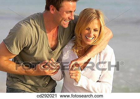 affection, bonding, bond, beach, 30's View Large Photo Image Stock Image - affection, bonding, bond, beach, 30's. Fotosearch