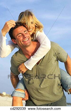 Stock Photo - affection, bonding, bond, beach, 30's. Fotosearch