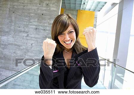 Stock Image - aggressiveness, businesspeople, business, brunette, aggressive. Fotosearch