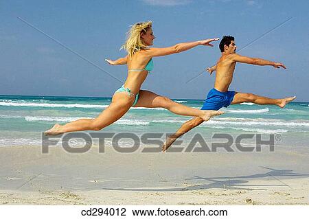 agile, beach, bathing-suit, agility, 30's View Large Photo Image Stock Image - agile, beach, bathing-suit, agility, 30's. Fotosearch