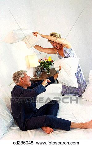 amusement, bed, at-home, activity View Large Photo Image Stock Photography - amusement, bed, at-home, activity. Fotosearch