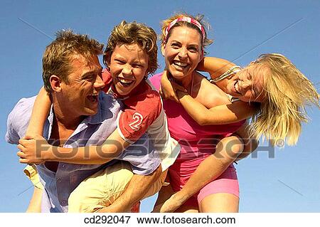 Stock Photo - amusement, brother, boy, 30's. Fotosearch