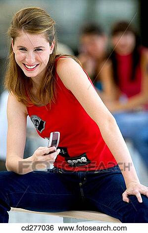 amusement, cell phone, adolescence View Large Photo Image Stock Photograph - amusement, cell phone, adolescence. Fotosearch