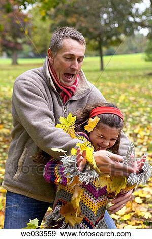 Stock Photo - amusement, child, autumn, 30's. Fotosearch