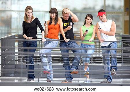 amusement, college, cell phone, boy, adolescence View Large Photo Image Stock Photo - amusement, college, cell phone, boy, adolescence. Fotosearch