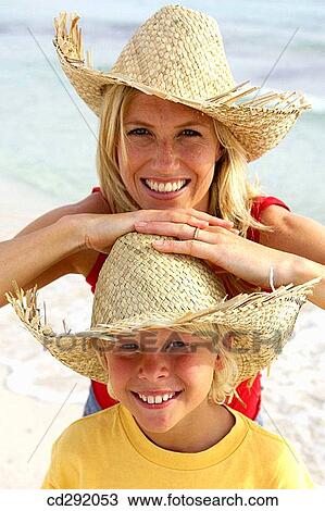 Stock Image - amusing, boy, beach, 30's. Fotosearch