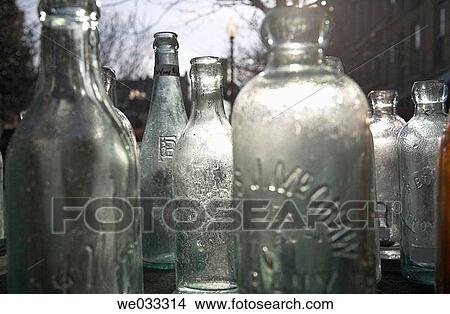 Antique bottles in wooden box View Large Photo Image Picture - Antique bottles in wooden box. Fotosearch