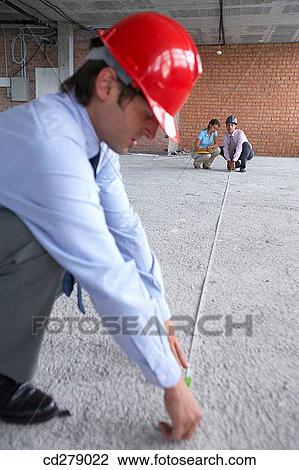 Stock Image - architect, checking, check, 30's. Fotosearch