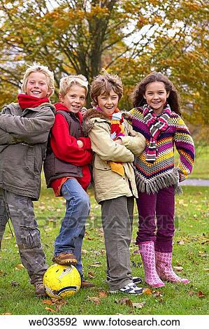 Arms crossed, boy, ball, arms folded, amusement View Large Photo Image Stock Image - Arms crossed, boy, ball, arms folded, amusement. Fotosearch