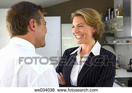 Stock Photo - Arms crossed, businessman, business, at-home, affection. Fotosearch