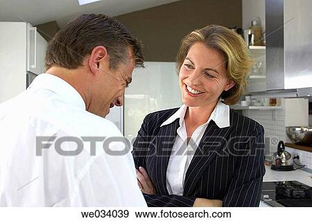 Stock Photo - Arms crossed, businessman, business, at-home, affection. Fotosearch