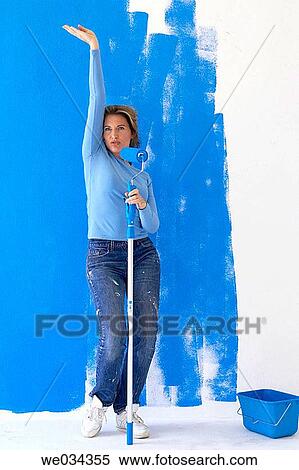 Arms raised, break, blue, at-home, amusing View Large Photo Image Stock Photography - Arms raised, break, blue, at-home, amusing. Fotosearch