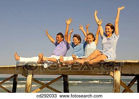 Arms raised, brother, boy, amusement View Large Photo Image Stock Image - Arms raised, brother, boy, amusement. Fotosearch