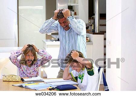 Stock Photograph - at-home, brother, boy, amusing. Fotosearch
