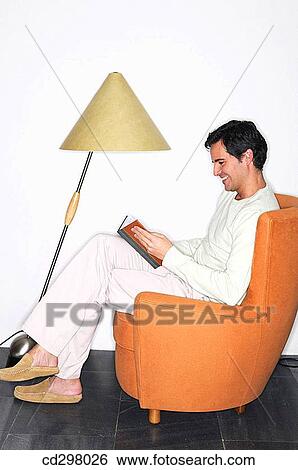 at-home, calm, book, armchair View Large Photo Image Stock Photograph - at-home, calm, book, armchair. Fotosearch