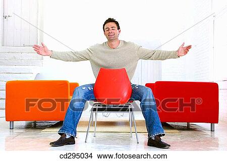 at-home, chair, Arms open View Large Photo Image Picture - at-home, chair, Arms open. Fotosearch