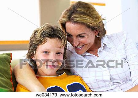 Stock Photo - at-home, chat, boy, affection. Fotosearch