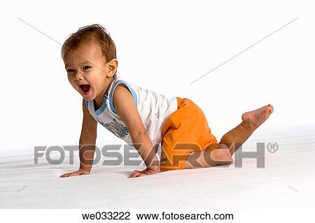 Baby boy crawling. View Large Photo Image Stock Image - Baby boy crawling.. Fotosearch