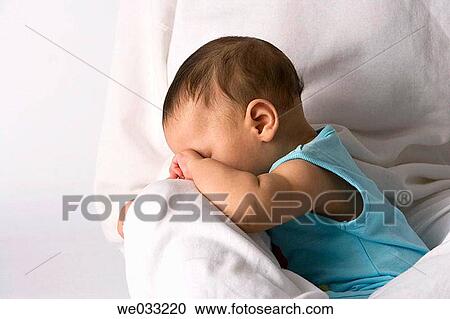 Baby rubbing his eyes. View Large Photo Image Stock Image - Baby rubbing his eyes.. Fotosearch