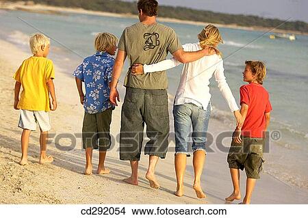 back view, barefoot, beach, boy, brother View Large Photo Image Picture - back view, barefoot, beach, boy, brother. Fotosearch