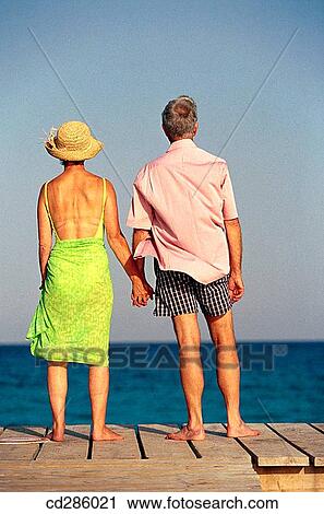 Stock Image - back view, barefoot, calm. Fotosearch
