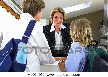 Stock Image - back view, brother, boy, at-home. Fotosearch