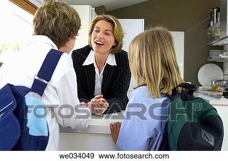 Stock Photo - back view, brother, boy, at-home. Fotosearch