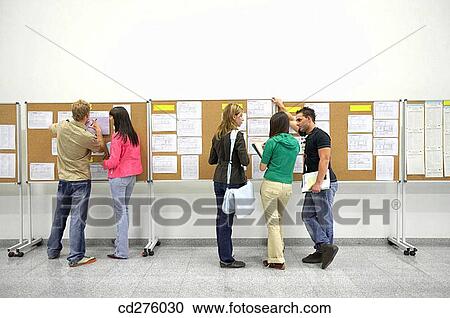 Stock Image - back view, chat, Bulletin board, boy, adolescence. Fotosearch