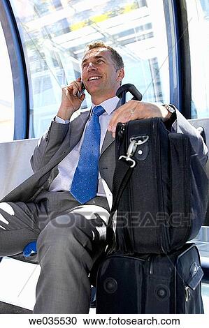 baggage, bench, business, Business travel, businessman View Large Photo Image Stock Image - baggage, bench, business, Business travel, businessman. Fotosearch