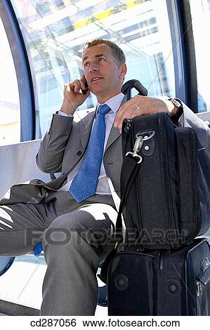 baggage, bench, business, Business travel, businessman View Large Photo Image Stock Photograph - baggage, bench, business, Business travel, businessman. Fotosearch
