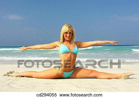 Stock Photography - balance, beach, blond. Fotosearch