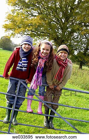 Stock Photography - balance, cap, brother, boy, amusement. Fotosearch