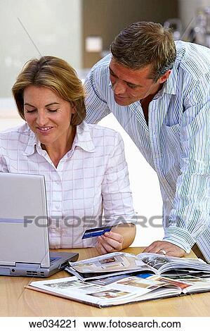 Bank card, catalogue, at-home View Large Photo Image Stock Image - Bank card, catalogue, at-home. Fotosearch