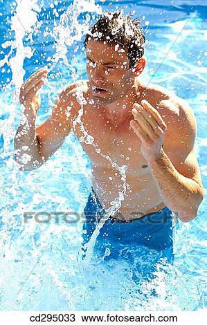 Stock Image - bathe, black hair, bathing-suit, bathing, action. Fotosearch