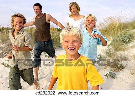 Stock Image - beach, brother, boy, amusement. Fotosearch