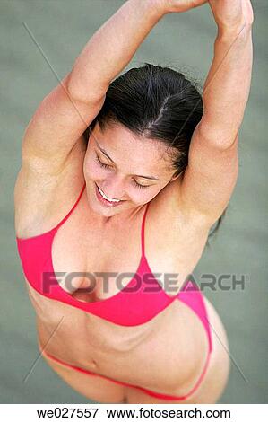 beach, brunette, Arms raised View Large Photo Image Stock Photo - beach, brunette, Arms raised. Fotosearch