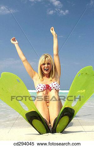 beach, carefree, blond, Arms raised View Large Photo Image Stock Photography - beach, carefree, blond, Arms raised. Fotosearch